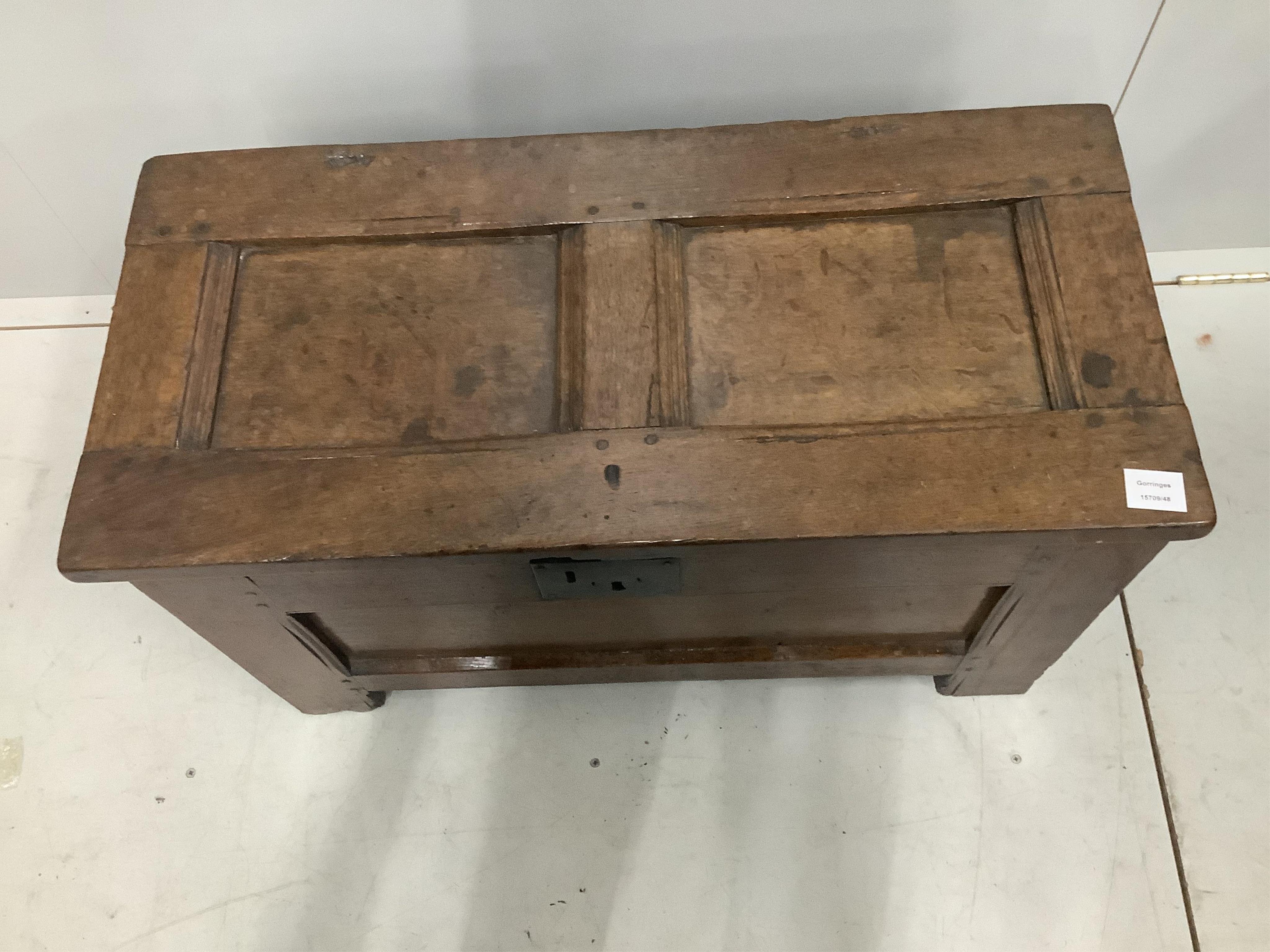 A small 17th century oak coffer, original wrought iron butterfly hinges, width 84cm, height 46cm. Purchased from Barling of Mount Street, London, 19th August 1977 for £585. Condition - fair to good